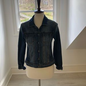 A dark blue denim jean jacket